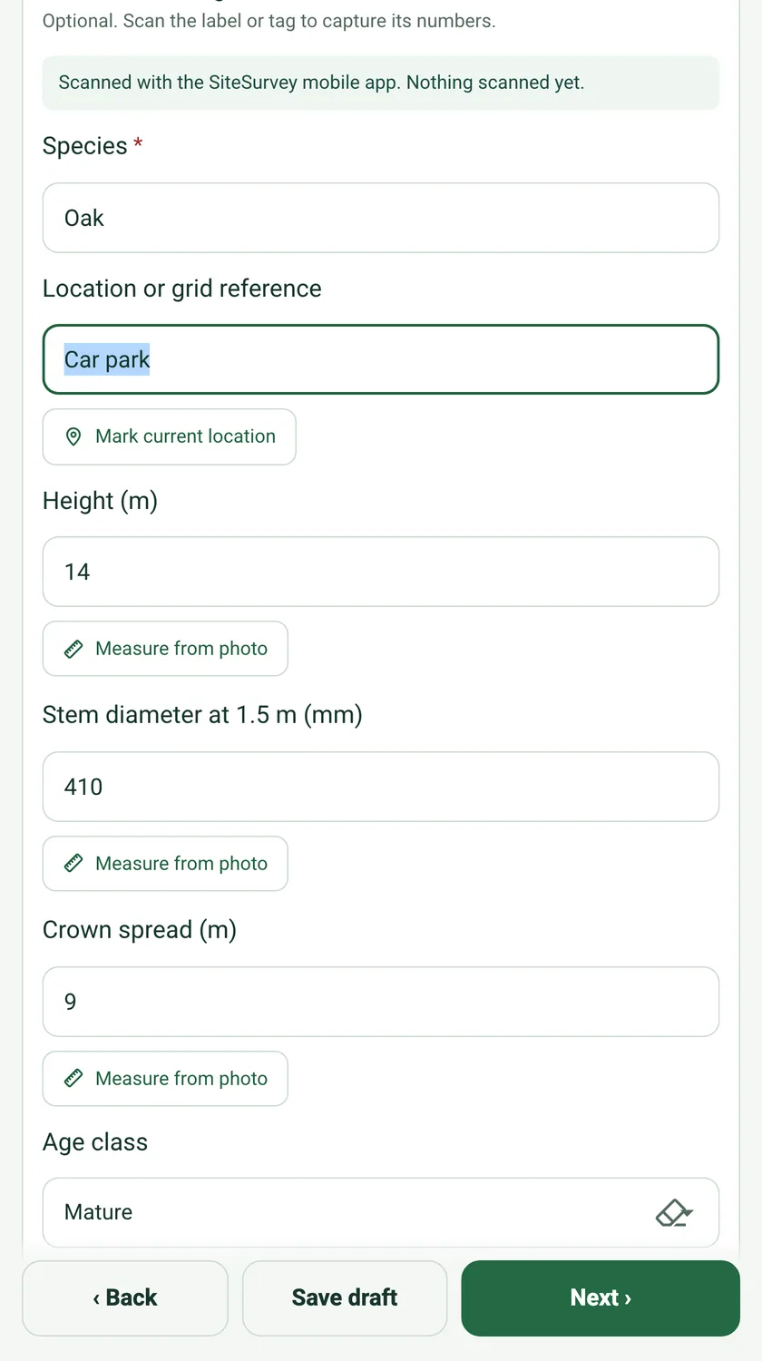 A tree's Location or grid reference field with the note Car park typed in and a Mark current location button below it