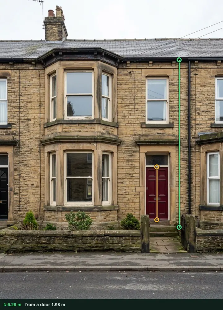 The front of a Victorian stone terrace measured from a photo at about 6.28 m from the ground to the eaves gutter, against the 1.98 m front door