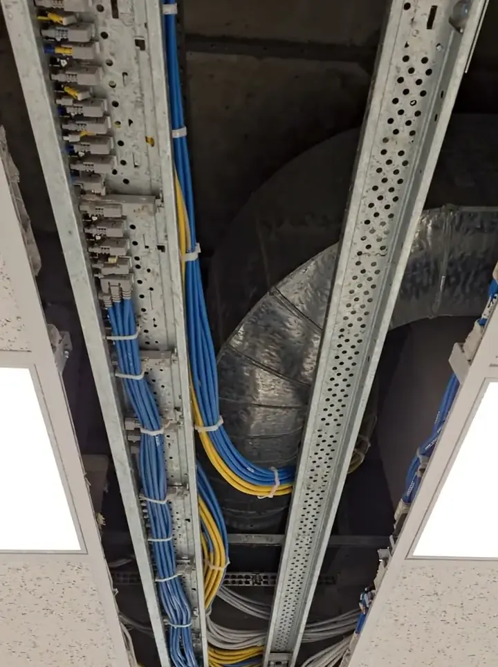 Cable tray running through an open ceiling void