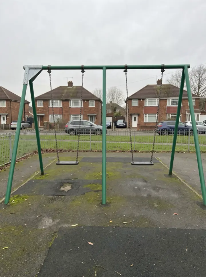 The same swing frame the next day with a new bracket fitted and both seats hanging normally