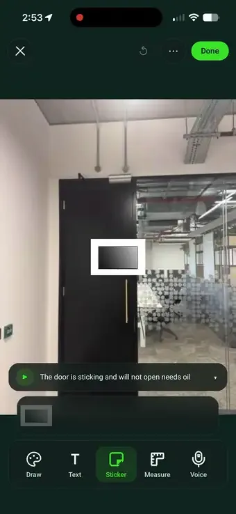 Placing a screen sticker onto a site photo in SiteSurvey and dragging it out to size