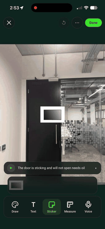 Placing a screen sticker onto a site photo in SiteSurvey and dragging it out to size