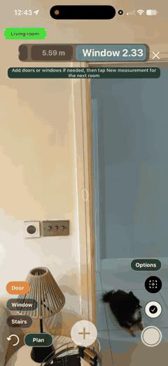 Tapping Door, then marking across a doorway — a 0.85m door opening is added to the plan