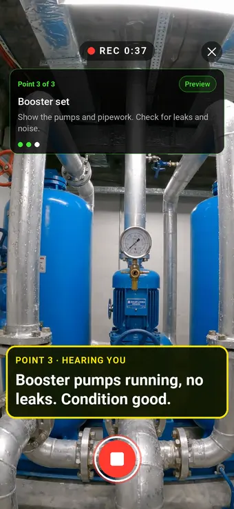 Walk Cam recording a water booster pump set in a basement plant room on an inspection round, with the point card and the live transcription on screen