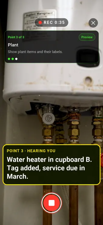 A water heater in a plant cupboard, with the Walk Cam point card and live transcription of the tag being added
