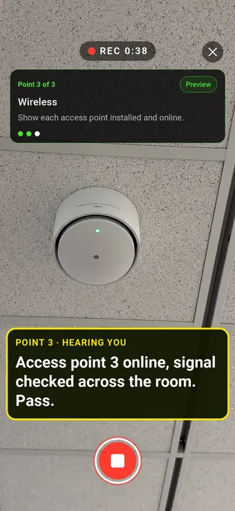 A ceiling-mounted wireless access point, with the Walk Cam point card and live transcription