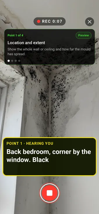 Walk Cam recording a black mould patch in a bedroom ceiling corner, with the point card and the live transcription on screen