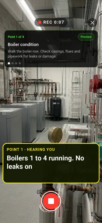 Walk Cam recording a row of boilers in a plant room, with the point card and the live transcription on screen