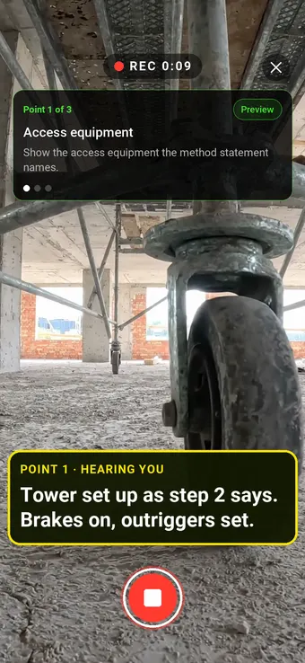 Walk Cam checking a mobile tower against step 2 of the method statement, brakes on and outriggers set, with live voice-to-text writing the note
