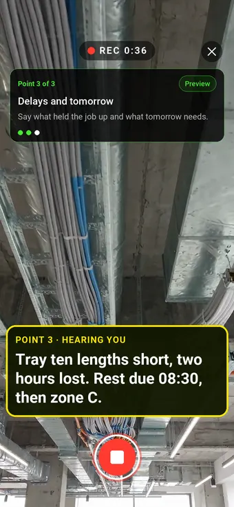 An open ceiling void with cable tray and data cabling, with the Walk Cam point card and live transcription
