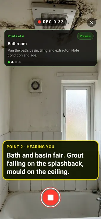 A social housing bathroom with failing grout and ceiling mould, with the Walk Cam point card and live transcription