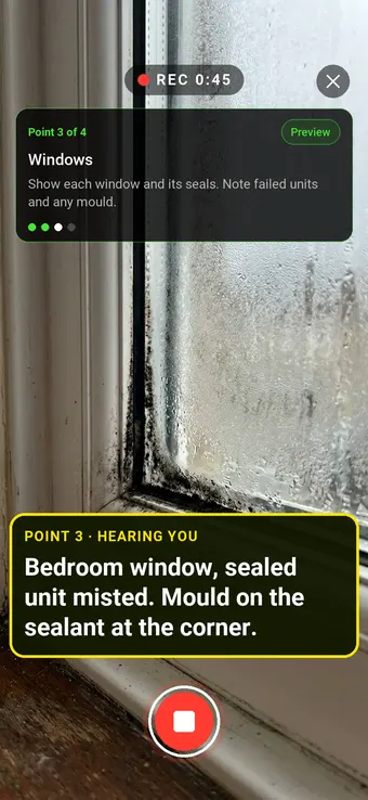 A misted double-glazed window with mould on the sealant, with the Walk Cam point card and live transcription