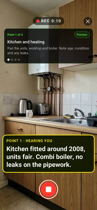 Walk Cam recording a housing association kitchen and its combi boiler, with the point card and the live transcription on screen